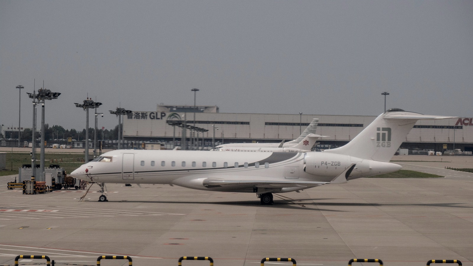 File photograph of a non-NetJets Bombardier Global 6500 parked on an airport apron; the pictured aircraft was not involved in the reported encounter